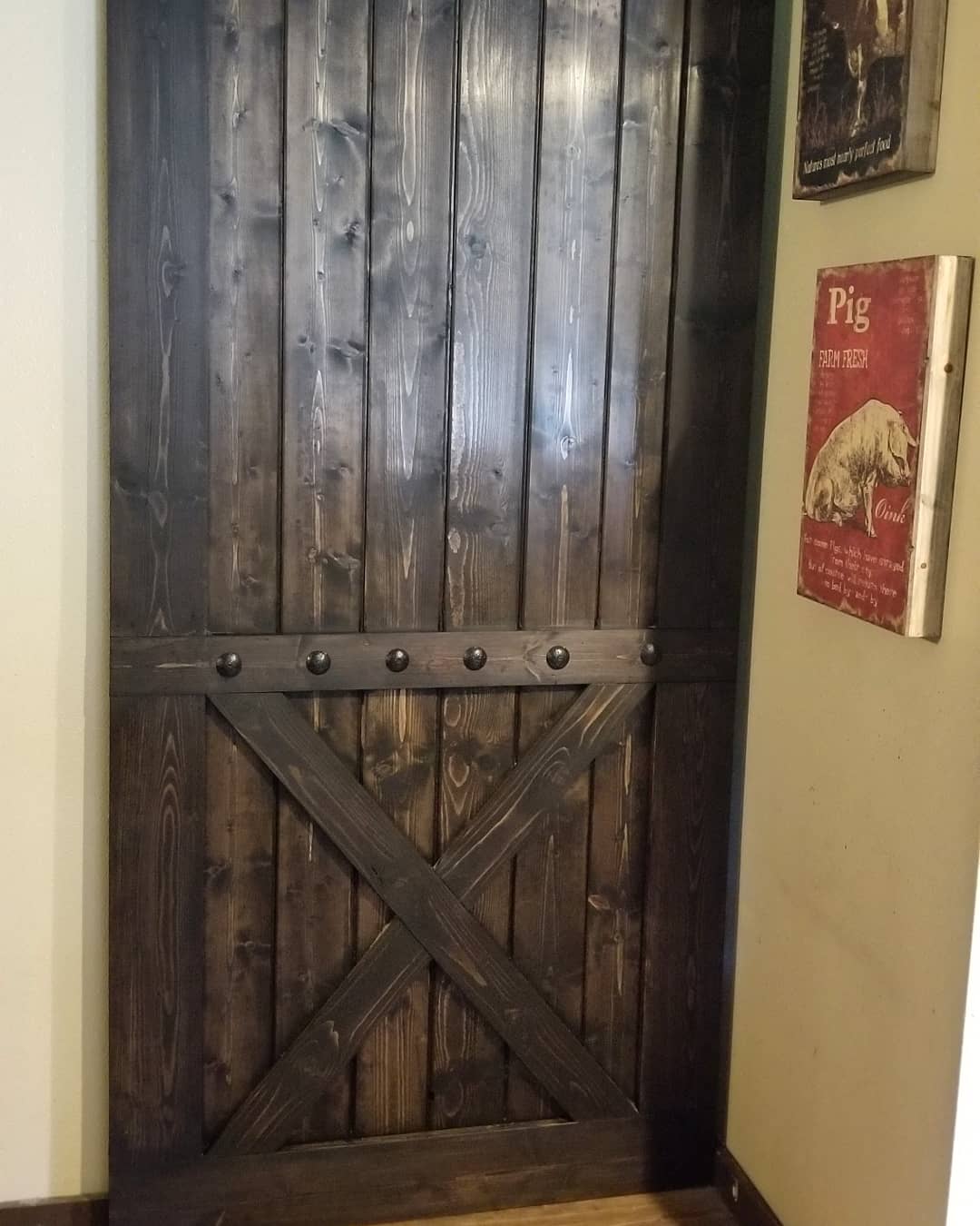 Custom Bottom Brace Interior Barn Door with wooden frame and handle