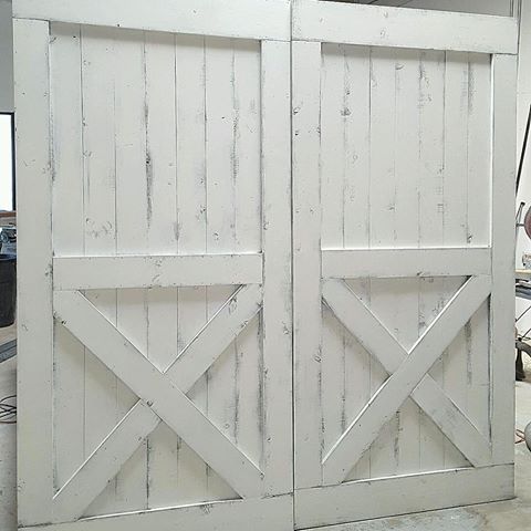Custom Bottom Brace Interior Barn Door in white with cross bars