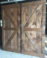 Dual wooden barn doors with British brace design