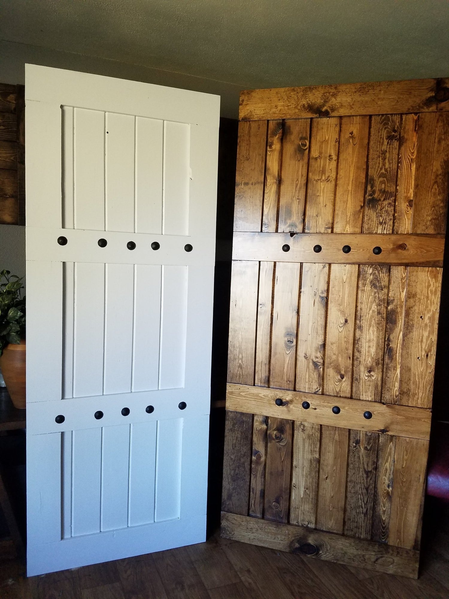 Custom Double Horizon Barn Door with distinctive wood panels and handle cutouts