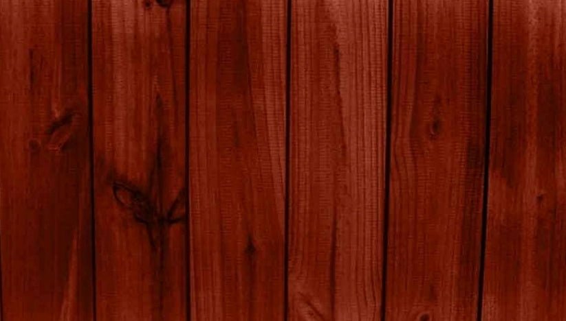 Detailed view of the grain pattern on rustic cedar wood