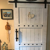 Barn door with wooden frame using Customized Barn Sliding Hardware
