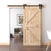 Room scene with a barn door featuring Customized Barn Sliding Hardware, white chair, and table