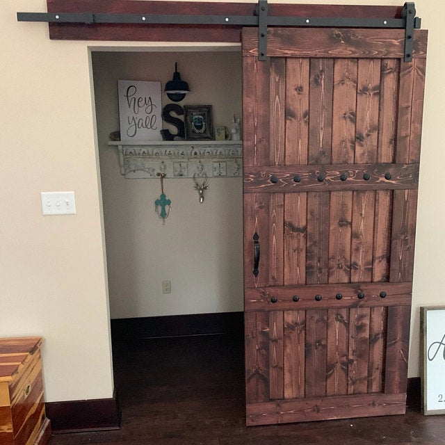 Rustic 84x33 Paneled Style Interior Barn Door with wooden frame