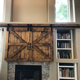 Fireplace setting featuring the TV Barn Door Package