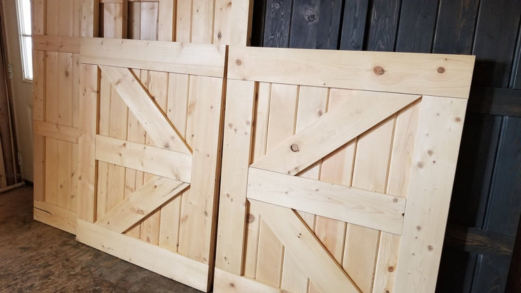 Unfinished Close-up view of the wooden slats on the doors of the TV Barn Door Package