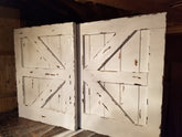 Custom white painted barn doors for TV cover